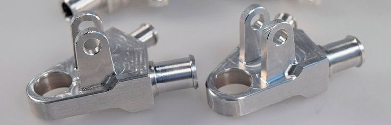 It’s Greenteam-Time: Für das Rennteam der Uni Stuttgart fräste der Prototypenbauer die Radträger aus einer Aluminiumlegierung.  (PS Prototypenschmiede)