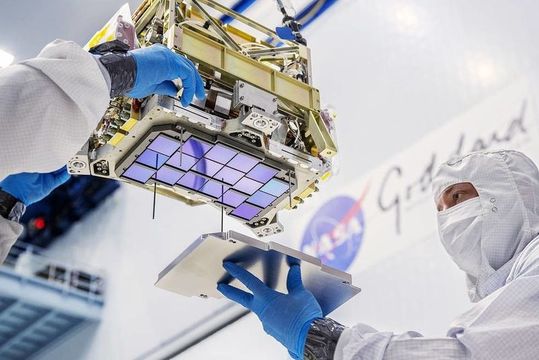 The detectors, each about the size of a salt cracker, have around 16.8 million tiny pixels and provide the mission with an excellent image resolution. Pictured: Lead technician Billy Keim mounts a cover plate over the space telescope's detectors.(Image: NASA/Chris Gunn)