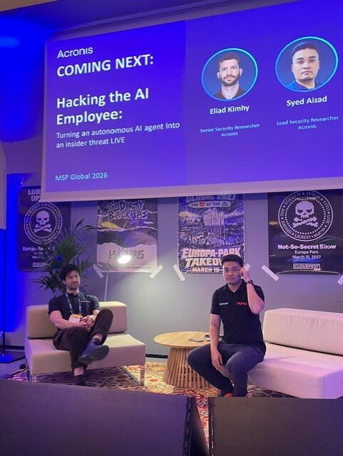 Eliad Kihmy, Senior Security Researcher bei Acronis, und Syed Aizad, Lead Security Researcher bei Acronis, zeigten anhand einer zuvor aufgezeichneten Live-Demonstration, wie leicht sich KI-Agenten hacken lassen.(Bild:  Vogel IT-Medien)