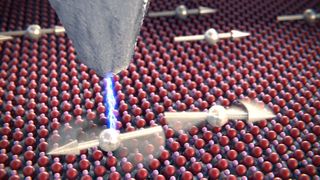 Künstlerische Darstellung des Experiments: Die Forscher haben mithilfe eine Stromstoßes den Spin von einem der zwei miteinander kommunizierenden Atome umgedreht. Doch die Kohärenz ist erhalten geblieben. Das hat womöglich Folgen für den Computerbau.  (Bild: Enrique Sahagún, Scixel)