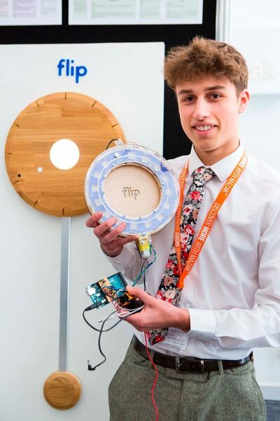 Chris Kalogroulis, also from the Sutton Grammar School, is Best Overall in the 17-19 age group, winning with his Flip magnetic clock. (MTA)