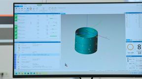 The dimension inspection process for the workpiece reference. The measurement software interface is displayed on the system monitor, which includes a 3D model of the measured surface of the part and the parameters of the inspection program. (Source: Mitutoyo Europe)