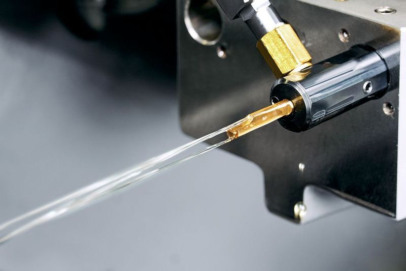 The coolant facility available on the Splash range of NTK’s Stick Duo line evacuates swarf from the work area and from inside small bores and holes. (Source: NTK)