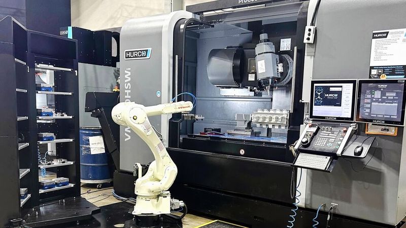 A Hurco / Kawasaki automated machining cell based on a 5-axis, swivelling-spindle Hurco machine. At Mach 2026, the robot system will feed a cantilever-type 5-axis model, VC500i.(Source:  Hurco Europe)