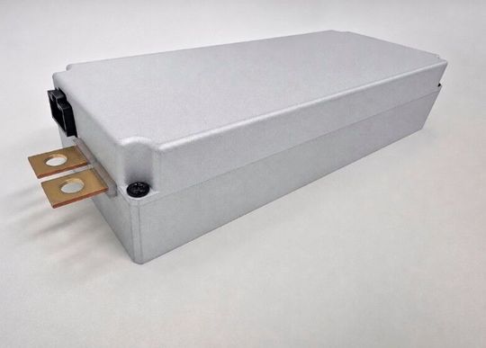 Figure 2 To fit inside the car battery pack, the system form factor had to be extremely small. The INFAC system is 215 x 45 x 82mm (W/D/H). The volume is 793cm3 and it weighs approximately 1.5kg.(Source:  Vicor)