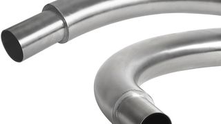 Den Doppelwand Rohrbogen gibt es auch in einer mit Beton ausgegossenen Variante, wodurch
Verschleißerscheinungen zusätzlich gemindert werden. (HS Umformtechnik)