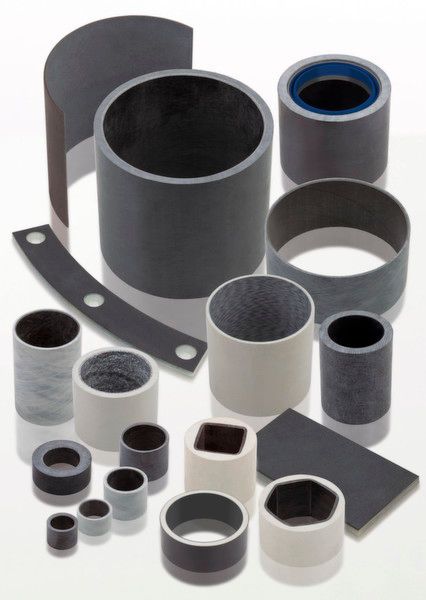 Gleitlager aus einem gefüllten PTFE mit einem Rücken aus durchgehend gewickelten Glasfasern, eingebettet in Epoxidharz. (Bild: GGB)