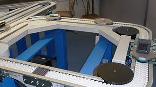 Mit der WTS-Chain können Materialflussanlagen mit den Grundelementen Transportstrecke, Horizontalbogen 90° und 180° sowie Werkstückträger-Einschleusung und-Ausschleusung individuell konfiguriert werden. (Archiv: Vogel Business Media)