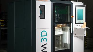 Der Exam 510 mit einer maximalen Baurate von aktuell 150 Kubikzentimetern pro Stunde (cm³/h). Perspektivisch peilt der Hersteller Bauraten von 300 bis 600 cm³/h an. (Bild: NEW AIM3D)