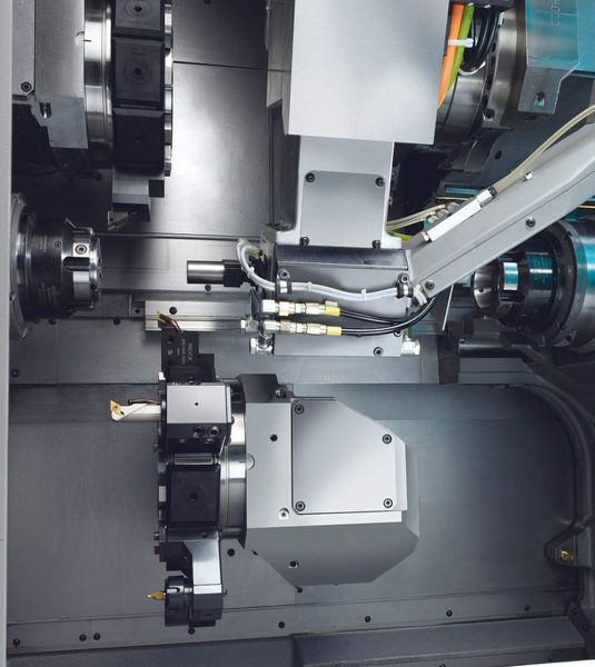 Bild 3: Schwenkarm für die automatische Zu- und Abführung der Drehteile in den Arbeitsraum des Drehautomaten Index C100. (Archiv: Vogel Business Media)