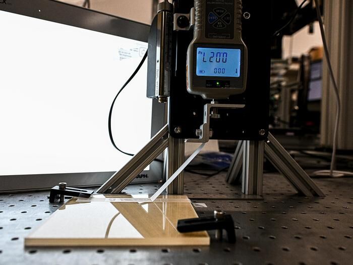 The research team built an automated device that can peel tape to designated distance, lay it back down and measure the amount of force needed to peel the tape.  (Source: Jaydyn Isiminger/ Penn State)