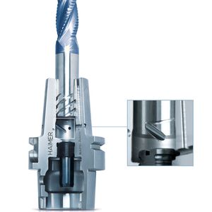 Bild 1: Beim Safe-Lock-System werden in den Schaft der Werkzeuge schraubenförmige Nuten eingeschliffen. In Kombination mit entsprechenden Mitnehmerstiften in den Werkzeugaufnahmen verhindern sie, dass bei Extrembearbeitungen das Werkzeug aus dem Futter gezogen wird.