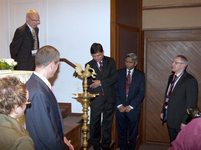 Keynote speaker Pabak Mukhopadhyay (middle), Head of Ports & Spl. Conveyors Segment Bulk Materials Handling Business Unit at Larsen & Toubro Limited, India lights the lamp during the traditional lamp lighting ceremony, carried out to wish for a successful event. (Picture: PROCESS)