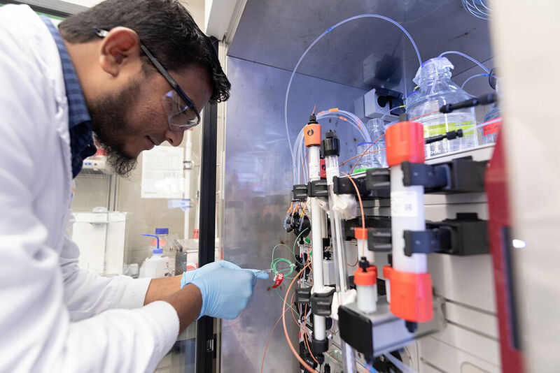 Umar Hameed performs size-exclusion chromatography, an important step in the purification of proteins.  (Helmy H. Alsagaff / Kaust)