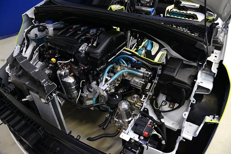 Kern des Konzepts sind eine Hydraulikpumpe, ein Hydraulikmotor und ein Druckspeicher. Die Hydraulikaggregate sind an der Antriebsachse montiert. Beim Bremsen ... (Foto: Peugeot)
