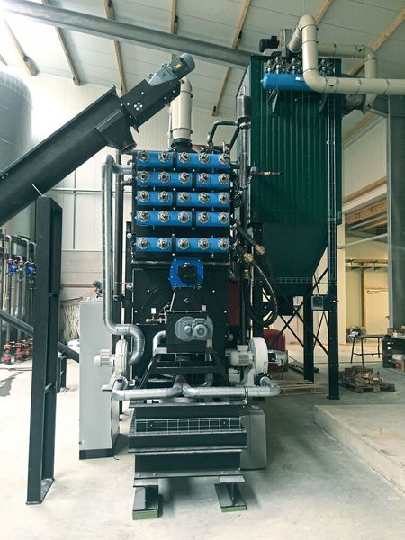 Eine harte Nuss für Anlagenbauer: So gelingt es, Wärme aus der Verbrennung von Nussschalen zu gewinnen. (Werkstätten)