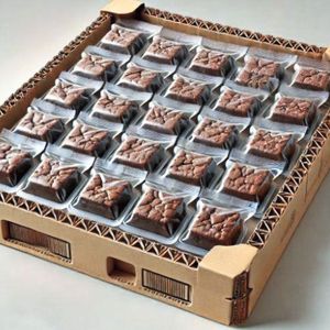 Süßes Gebäck benötigt stabile Verpackungen, die den empfindlichen Inhalt vor Stoß und Druck schützen(Bild:  Gampack Group)