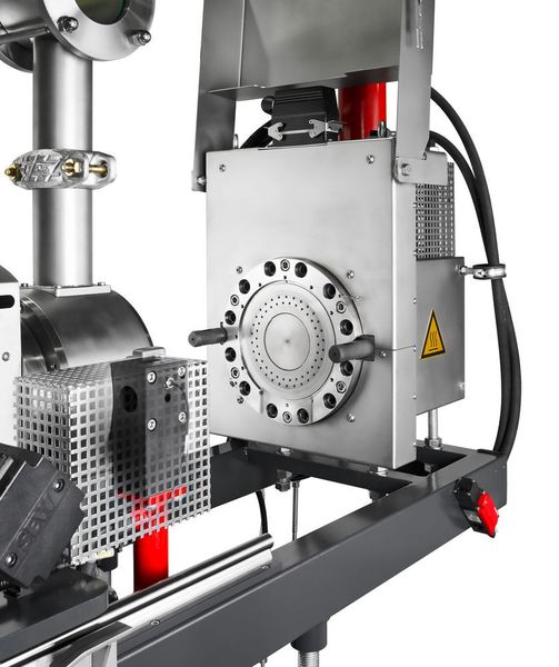 Unterwasser-Granulierung per Econ-Granulierkopf EUP 150 mit hydraulischem Verschluss: Der thermisch isolierte Granulierkopf ist mit Multihole-Düsen versehen, die auf die Produktion des Mikrogranulats abgestimmt sind. (Krauss-Maffei Berstorff)