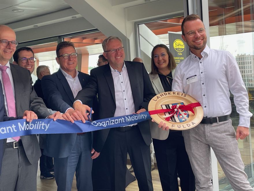 7 (Cognizant Mobility GmbH)