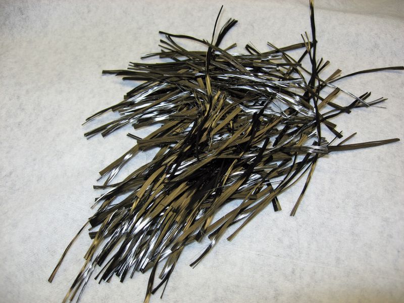 Dem STFI ist es im Jahr 2005 gelgungen, die Vliesbildung unter Verwendung von Primär-Carbonfasern mit mehr als 50 mm Länge mit Hilfe des Kardierverfahrens nachzuweisen. (Bild: STFI)