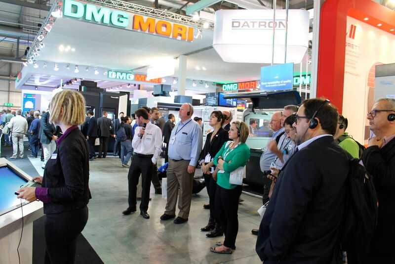 Istma members enjoyed a comprehensive tour around the large DMG Mori booth. (Source: Schulz)
