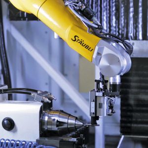 Der Stäubli TX60L eignet sich mit dem grossen Bewegungsradius und der schnellen Bestückungs- und Ausgabekapazität perfekt für die Aufgabe.