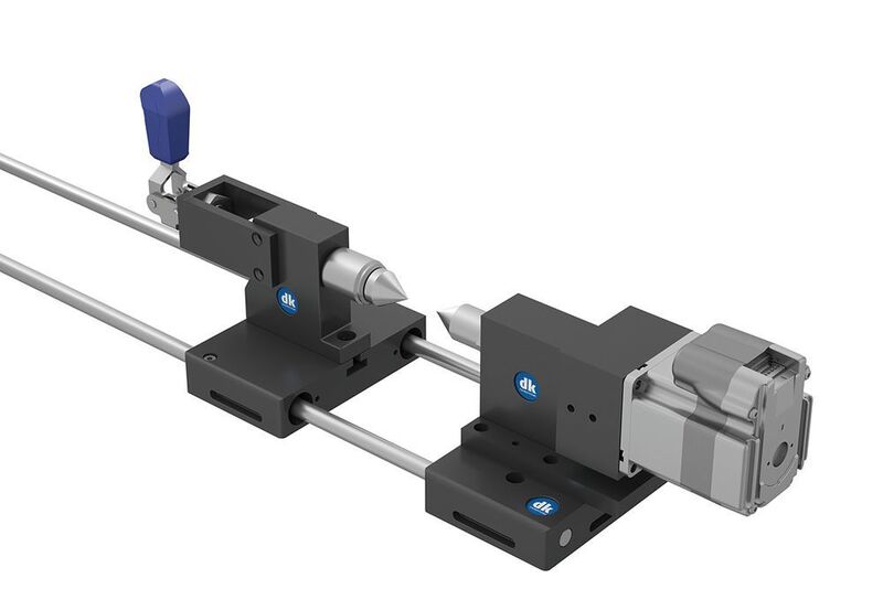 Tailstock with motor controlled from the laser device Diamond coated carrier centre for secure grip on the workpiece. (DK Fixersysteme)