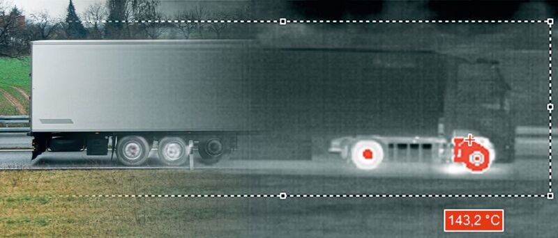 Das Anwendungsbeispiel zeigt einen vorbeifahrenden Lastkraftwagen, der mit Infrarot-Messtechnik auf kritische Temperaturen untersucht wird. (DIAS Infrared)