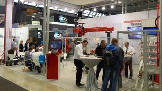 Messestand von Reis Robotics auf der Blechexpo 2013 in Stuttgart. (Bild: Reis)