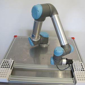 Handling von Proben mit Roboterarm von Smart Robotics und Greifer von Gimatic.