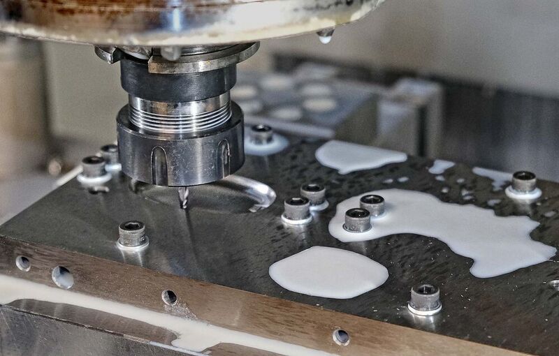 The VMX30i milling a cavity into the aluminium base block for a bottle mould. (Hurco)