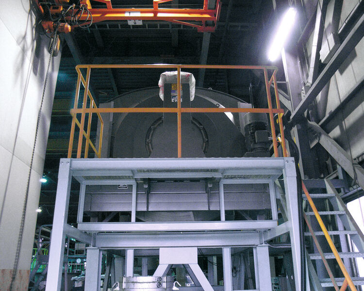 Batches of metal powder typically weighing 4,000 kg are loaded into the Munsion Rotary Batch Mixer from an overhead container that is moved into position by a crane. (Picture: Munsion)