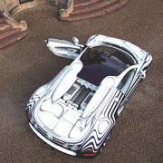 Bugatti L´Or Blanc („Weißes Gold“): Der mit Porzellan überzogene Supersportwagen wird vom über 1000 PS starken Aggregat des Veyron Grand Sport befeuert. (Bugatti)