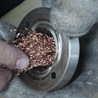 Copper gauze for cleaning and polishing exposed round or conical surfaces. (Source: Guill)