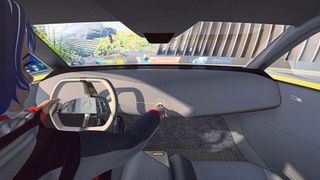 No switches, buttons, or displays: In the BMW i Vision Dee, the driver communicates using voice and gestures. Relevant information can be projected onto the windshield. (Image:BMW)