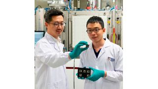 With the potential to achieve more than 50 % power conversion efficiency, this new triple-junction perovskite/Si tandem solar cell technology developed by Assistant Professor Hou Yi (left) and Dr Liu Shunchang (right) paves the way for a wide range of applications to harness solar energy with space constraints. (Source: NUS)