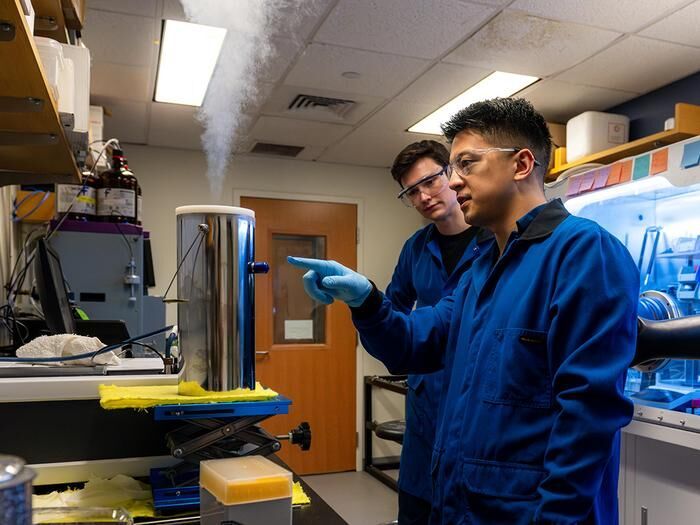 Penn State Assistant Professor of Chemistry Jonathan Kuo and graduate student Alexander Arnette in the lab. (Source: Jaydyn Isiminger/ Penn State)