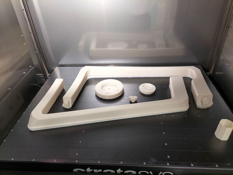 Prototype parts with an aesthetic function, designed for a non-functional demonstration aircraft, printed in ASA with the Stratasys F770 3D printer. (Stratasys)