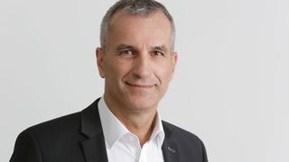 Albrecht Reimold, Produktionsvorstand beim Sportwagenhersteller Porsche, hält beim Smart Factory Day die Keynote und spricht über die Produktionsstrategie seines Unternehmens. (Porsche)