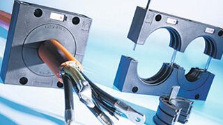 Das Kabeldurchführungssystem Jumbo von Murrplastik dichtet vorkonfektionierte Leitungen mit einem Durchmesser bis 65 mm  nach Schutzart IP65 ab. (Bild: Murrplastik)