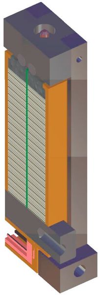 Bild 2: Prototyp als aktives, komplex aufgebautes Verbundbauteil. Befestigungselemente, Aktorköpfe, Aktuatoren, Trennlage, Grundplatte und elektrische Anschlüsse wurden mit Kunststoff umspritzt. (Archiv: Vogel Business Media)