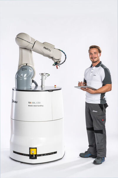 Das mobile Robotersystem Helmo von Stäubli navigiert selbständig zu seinem Arbeitsplatz, verringert seine Geschwindigkeit oder bleibt stehen, wenn ihm menschliche Kollegen zu nahe kommen, um dann seine Fahrt zielgerichtet fortzusetzen. (Stäubli)