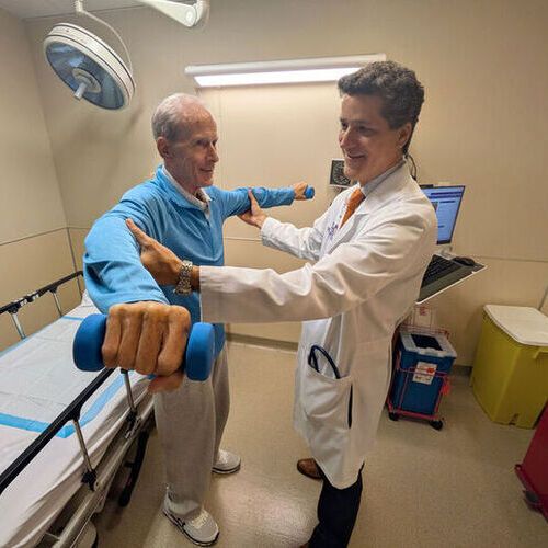 Study senior author Dr. Andres Duarte (right) and transplant candidate Steven McGowan at Northwestern Medicine Organ Transplant Center in Chicago. (Source:  Northwestern University / Ben Schamisso)
