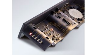 Gewellt: Plane Leiterplatten sind passé – dieser 3-D-MID Demonstrator hat die Form einer elektrischen Wasserwaage. (MID-TRONIC)