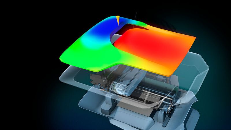 Simulation eines Spritzgiessprozesses: Verlauf der Füllung eines grossflächigen Gehäuseteils für einen Drucker. Gelber Kegel = Anbindungspunkt, die Zeitskala erstreckt sich von blau nach rot. (Bild: Autodesk)