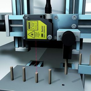 Bild 2: Kopf eines Handlingroboters mit Differenz-Sensor zur sofortigen Prüfung der Einstecktiefe der abgesetzten Wellen.