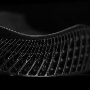 New Balance Triple Cell soles that are printed with the new Rebound resin on Formlabs 3D printing machines.