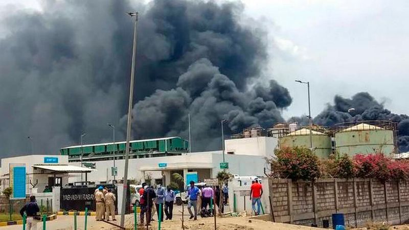 Plume of black smoke is visible post the fire outbreak at the chemical plant in Gujarat, India. (PTI)