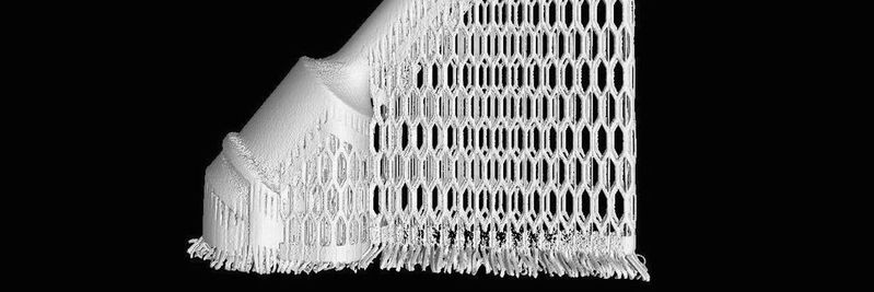 3D-Ansicht der nicht-hirtisierten Düse mit Stützstruktur. 3D-Ansicht der nicht-hirtisierten Düse mit Stützstruktur.