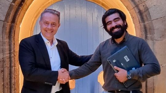 Michael Wittmann (left) welcomes Redouane Soukrat to the Wittmann Group.(Source:  Wittmann)